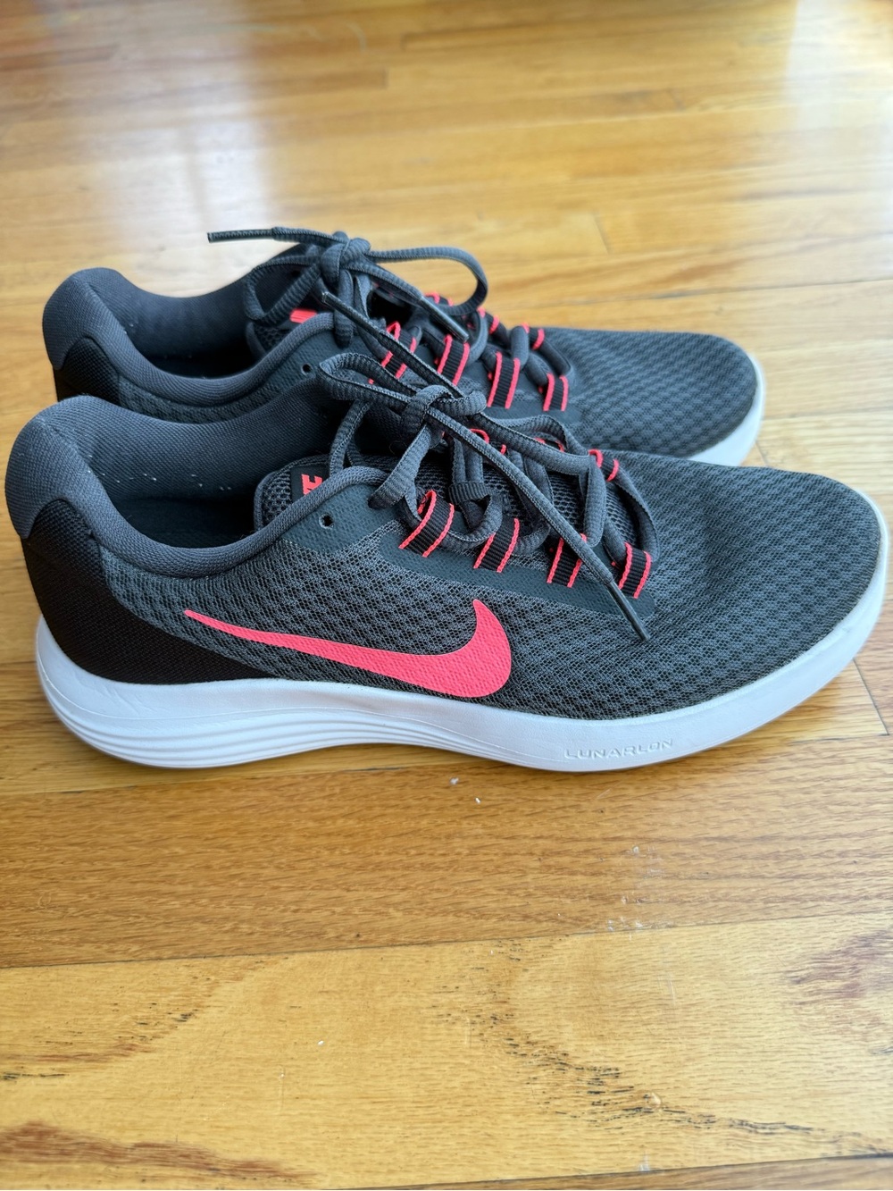 Nike Grey Running Shoes with Pink Accent